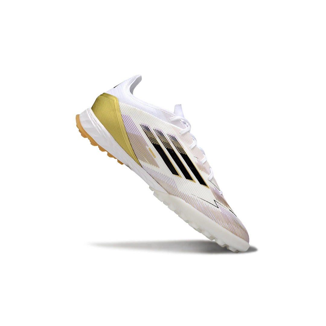 F50 Elite أبيض/ذهبي - TF