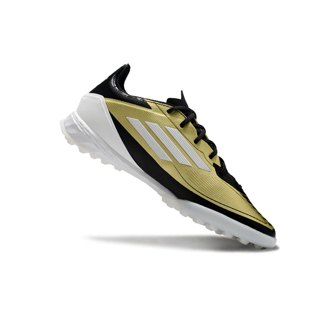 F50 Elite أسود/ذهبي - TF